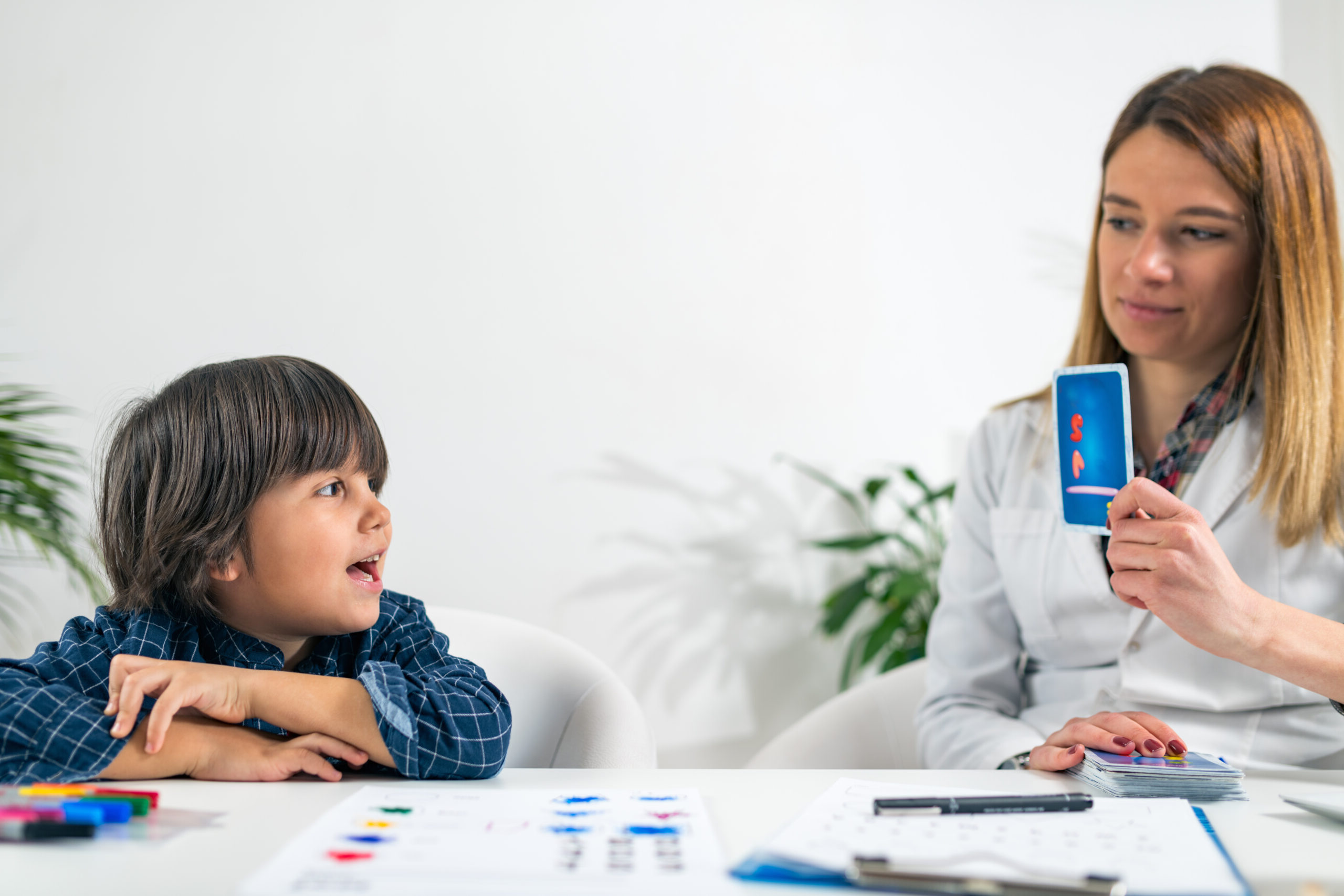 Mental Health Test for Children. Toddler Doing Logic Test with Cards